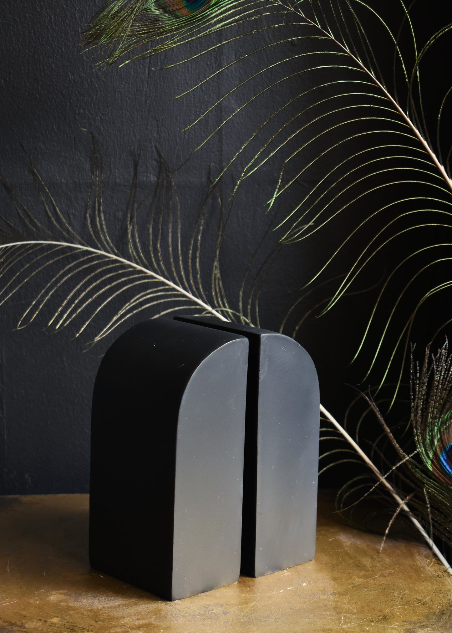 Pair Of Embossed Sunburst Eye Bookends