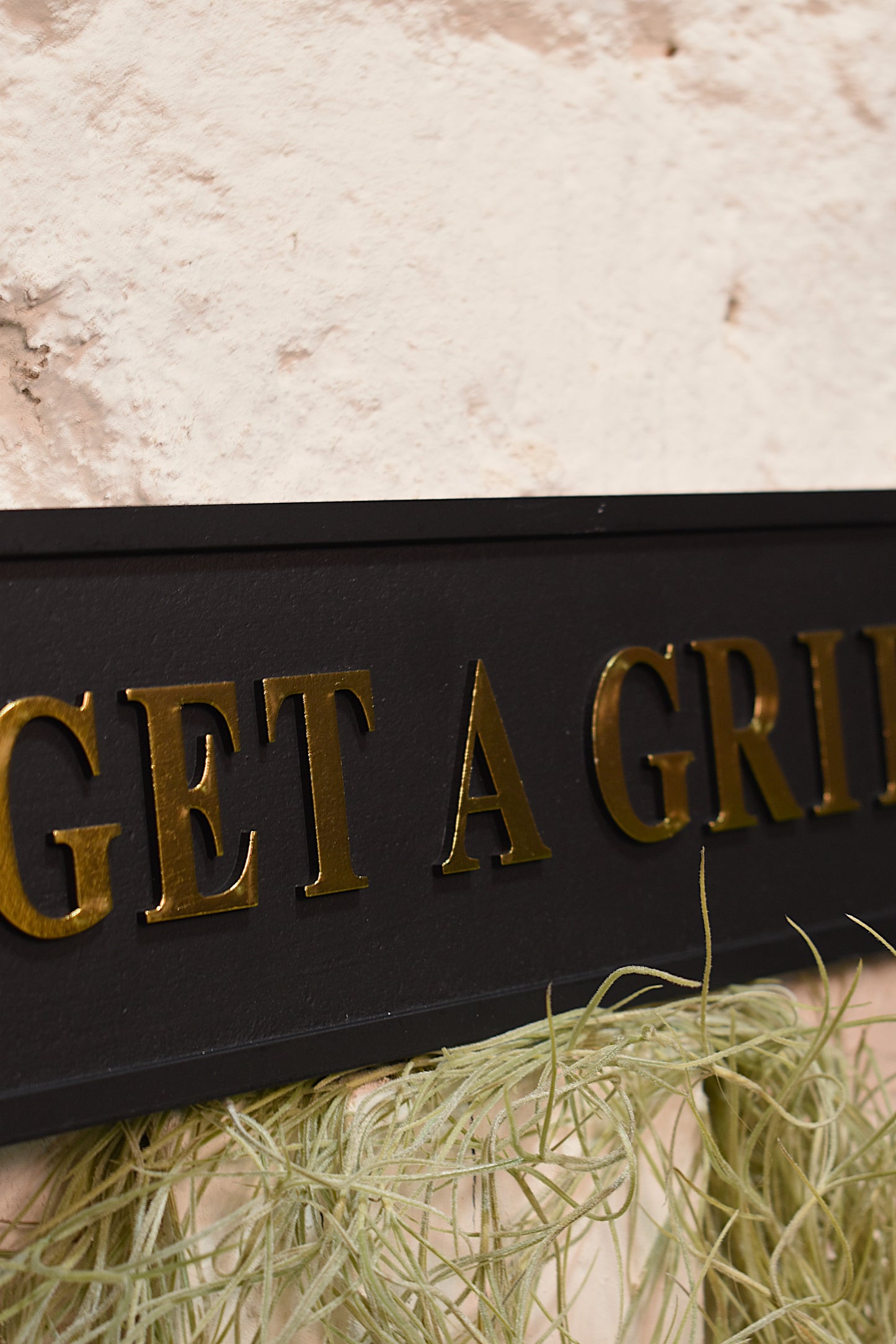 'Get a Grip' Wall Sign